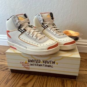 Nike Jordan - Maison Château Rouge × Air
Jordan 2 'United Youth International'
